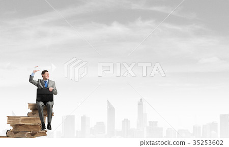 Businessman with signboard Businessman with signboard 35253602