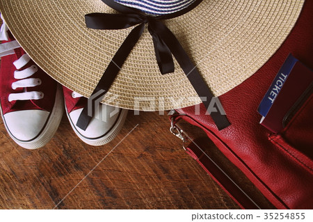 Women summer outfit: red sneakers, backpack, hat 35254855