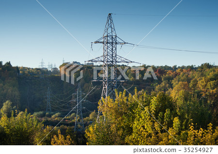 high voltage post at autumn forest 35254927