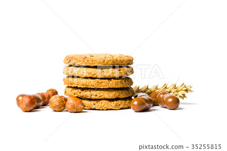 Integral cookies with hazelnuts on white Integral cookies with hazelnuts on white 35255815