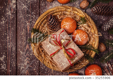 Christmas composition with tangerines, gift boxes 35255906