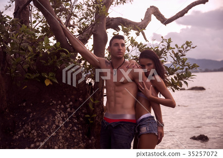 Outdoor pretty beautiful young romantic couple 35257072