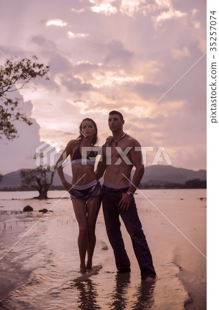 Outdoor pretty beautiful young romantic couple Outdoor pretty beautiful young romantic couple 35257074