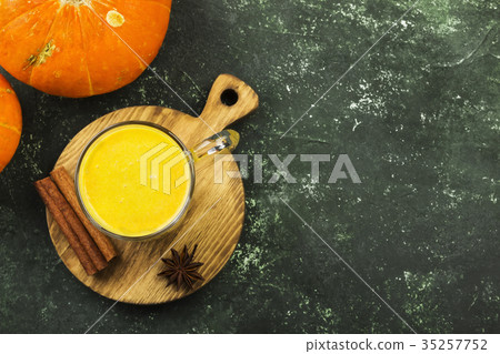 Pumpkin latte with spices (cinnamon, anise) 35257752