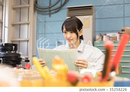 Factory person working quality control inspection 35258226
