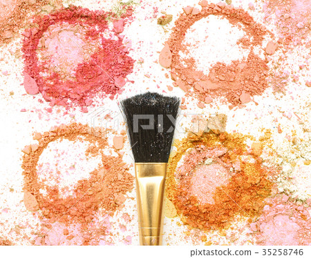 Golden blush make up on crushed make up powder 35258746