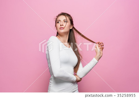The young woman's portrait with thoughtful The young woman's portrait with thoughtful 35258955
