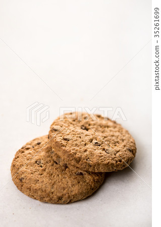 Brown chocolate biscuits isolated on the marble 35261699