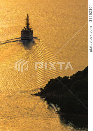Kujukushima Island sightseeing boat and golden sunset Kujukushima Island sightseeing boat and golden sunset 35262304