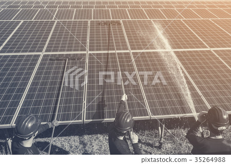 labor working on cleaning solar panel  35264988