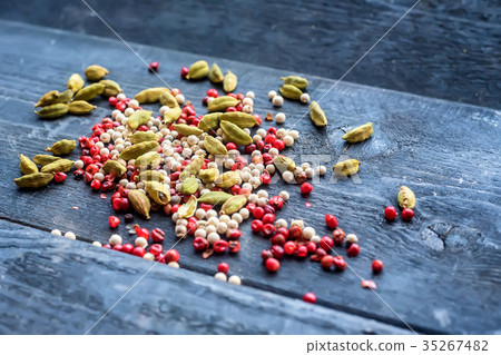 Closeup colorful spices mixture on dark background 35267482