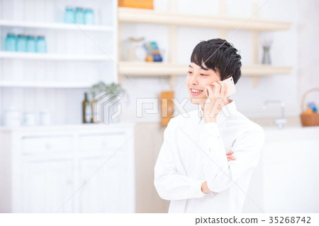 Young man using smartphone Mobile phone male portrait Refreshing young college student Fresh 35268742