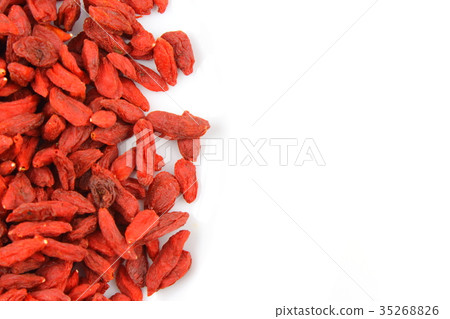 dried goji berries on a white plate 35268826
