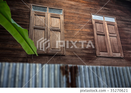 Thai style house wood windows closed Thai style house wood windows closed 35270621