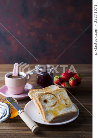 Fresh and bright continental breakfast table Fresh and bright continental breakfast table 35271071