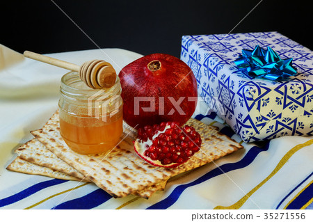 honey pomegranate for traditional holiday symbols 35271556
