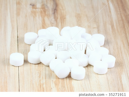 Pile of softener salt pellets Pile of softener salt pellets 35271911