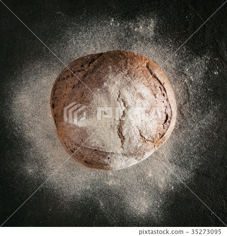 Whole homemade rye bread top view 35273095