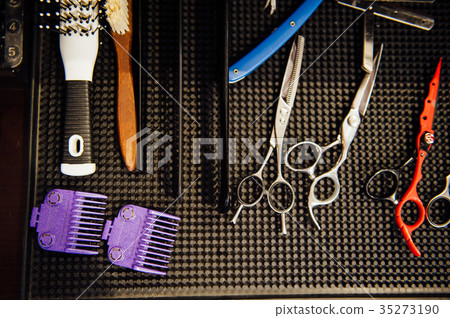 Mens hairdressing desktop with tools for shaving 35273190