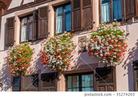 Flowers on the facade of a traditional half Flowers on the facade of a traditional half 35274203