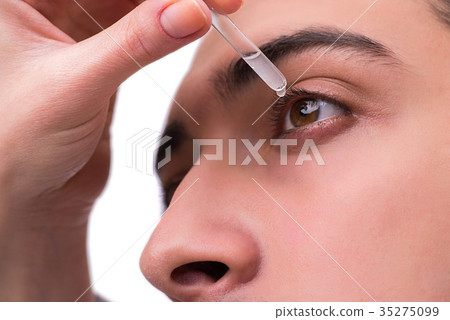 Young man in eye care medical concept 35275099