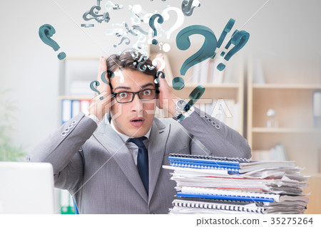 Businessman in uncertainty concept with many 35275264