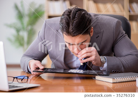 Drug addict businessman in the office 35276310
