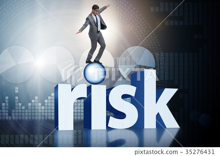 Young businessman in business risk and uncertainty 35276431