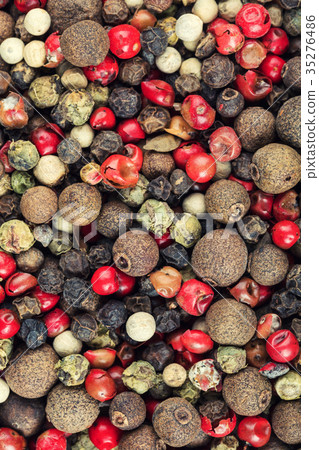 Colored peppers mix background Colored peppers mix background 35276486