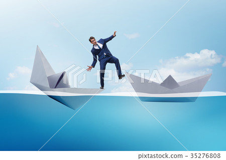 Businessman escaping sunken paper boat ship 35276808