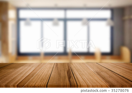 Empty of wood table top on blur of window glass in the morning b 35278076