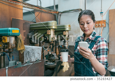 beautiful milling machine factory female worker beautiful milling machine factory female worker 35283427