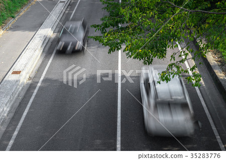 Motion blur of cars over the road Motion blur of cars over the road 35283776