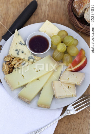 Cheese and fruits 35284853
