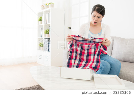 beautiful woman received online shopping package beautiful woman received online shopping package 35285366