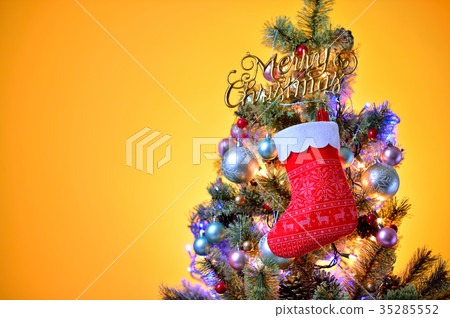 Merry Christmas, Christmas tree and present socks and ornaments. Merry Christmas, Christmas tree and present socks and ornaments. 35285552