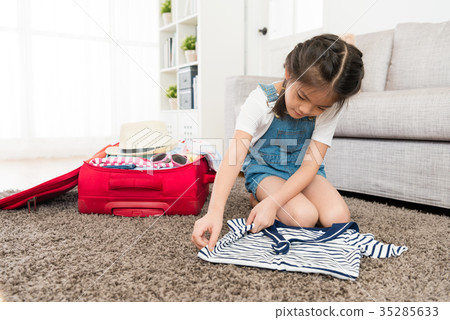 young beautiful female children sitting on floor 35285633