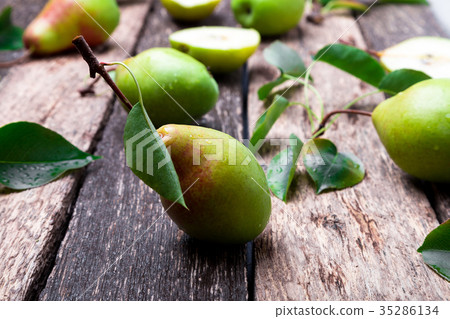 Pear on wooden rustic background. Autumn harvest. 35286134