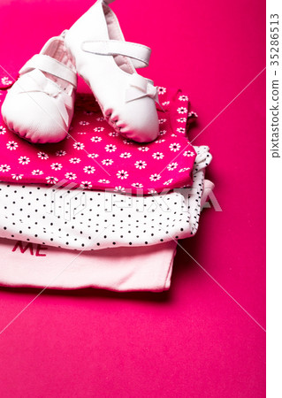 Folded pink bodysuit with shoes 35286513