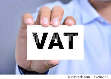 VAT letters on business card shown by a man 35288342