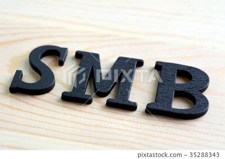 SMB letters on wood background 35288343