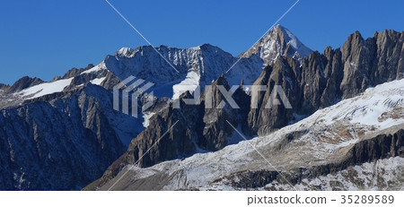 Rugged mountains and glacier in Valais Canton. Rugged mountains and glacier in Valais Canton. 35289589
