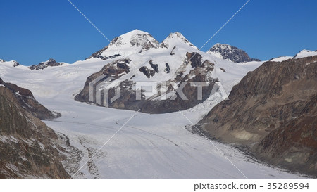 Distant view of the Jungfraujoch. Aletsch glacier. Distant view of the Jungfraujoch. Aletsch glacier. 35289594