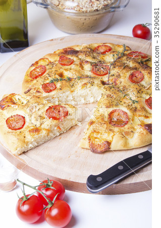 Fresh bread focaccio with tomatoes and cheese Fresh bread focaccio with tomatoes and cheese 35290681