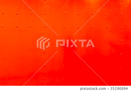 Red color painted on metal textured background. Red color painted on metal textured background. 35290894