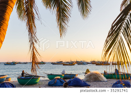 Vietnam village fishing boats ships sunset light Vietnam village fishing boats ships sunset light 35291741