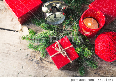 Red present box candle clock Christmas composition 35291765