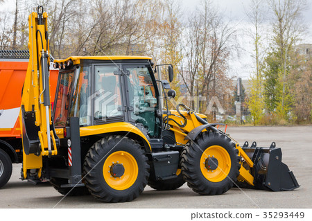 Yellow road constructor tractor -industrial Yellow road constructor tractor -industrial 35293449