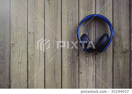 wireless headphones blue and black on old painted 35294037