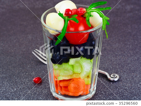 Dietary delicious salad in glass of arugula, pear Dietary delicious salad in glass of arugula, pear 35296560